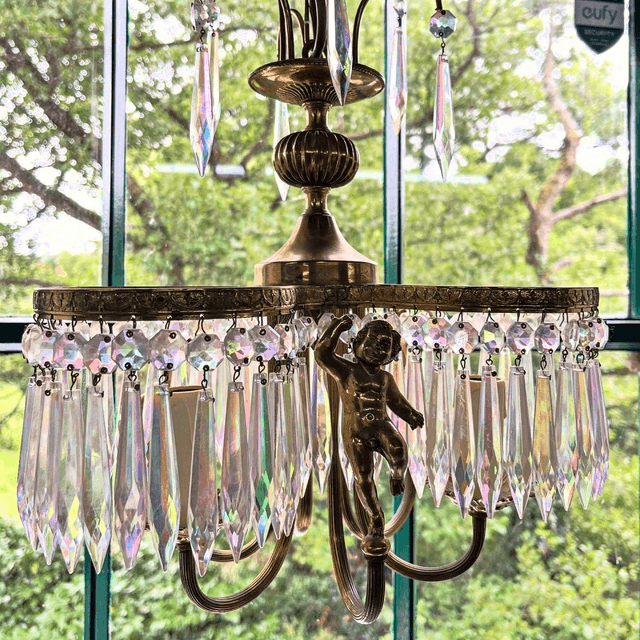 A 20th Century Three Stem Chandelier Adorned With Cherubs & Glass Crystals
