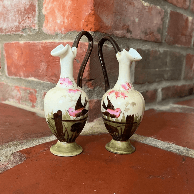 Pair Of Antique Continental Porcelain Ewers Adorned With Flowers And Birds 