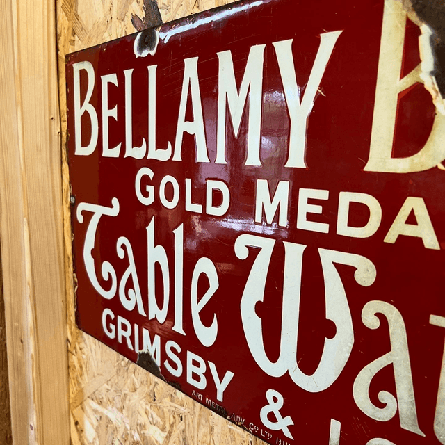 A Late 19th/ Early 20th Century Bellamy Bros Gold Medal Table Waters Enamel Advertising Sign