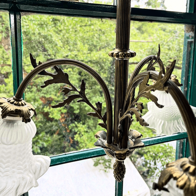 A 19th Century Brass Three Arm Chandelier With French Tulip Glass Shades