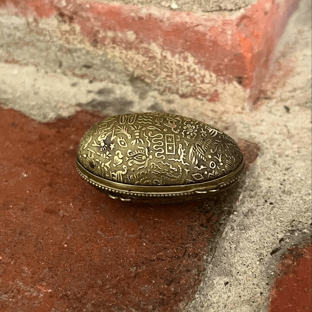 A 19th Century Victorian Egyptian Revival Coin Purse of Egg Form