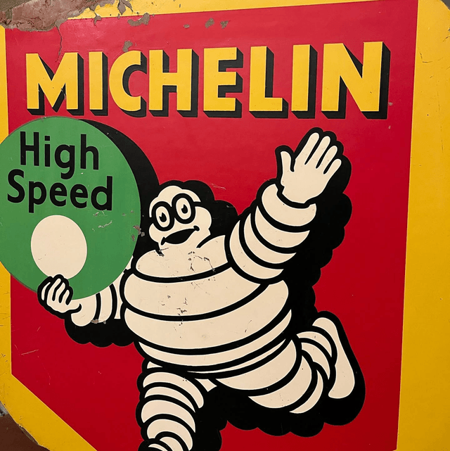 1957 Michelin High Speed Pictorial Hard Board Advertising Sign