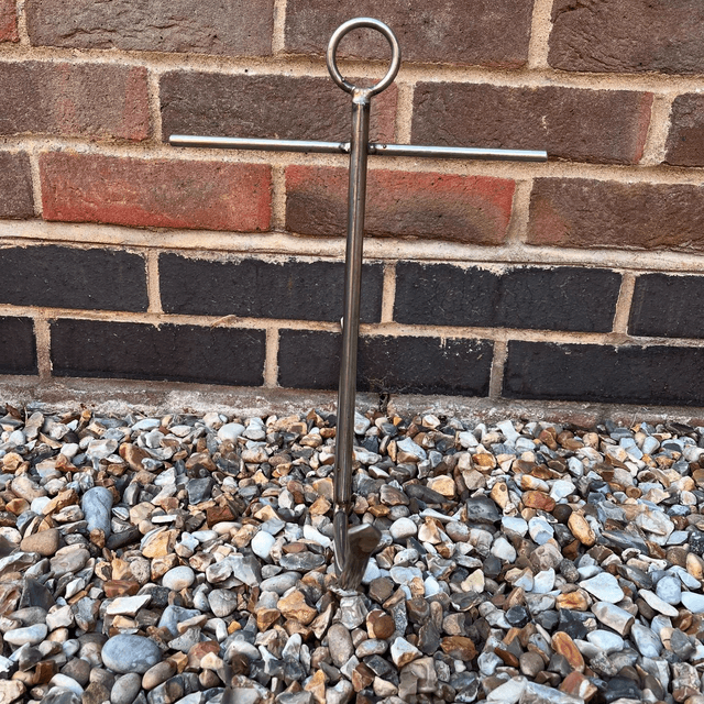 A Stainless Steel Decorative Sculpture Of An Anchor 