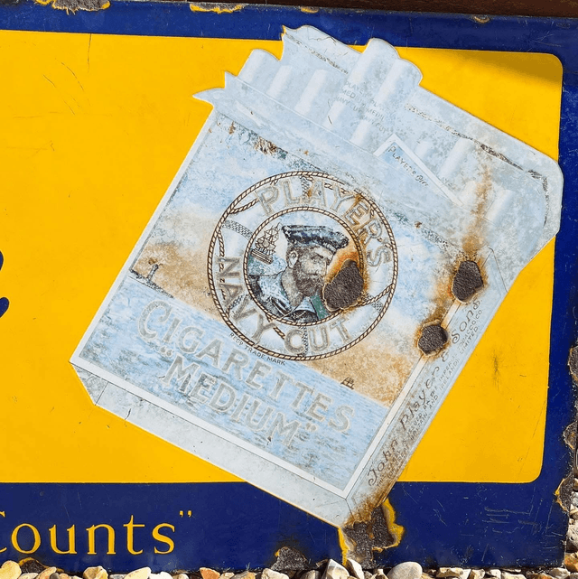 Player’s Please “It’s The Tobacco That Counts” Player’s Navy Mixture Enamel Advertising Sign