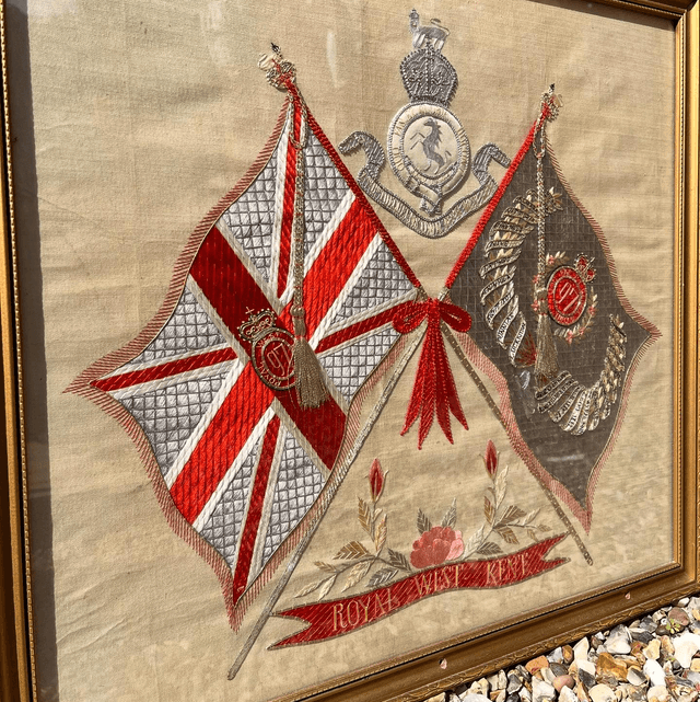 A Framed, Embroidered Silk Piece Depicting The Regimental Colours And Badge Of The Royal West Kent Regiment