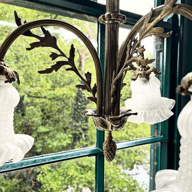 A 19th Century Brass Three Arm Chandelier With French Tulip Glass Shades
