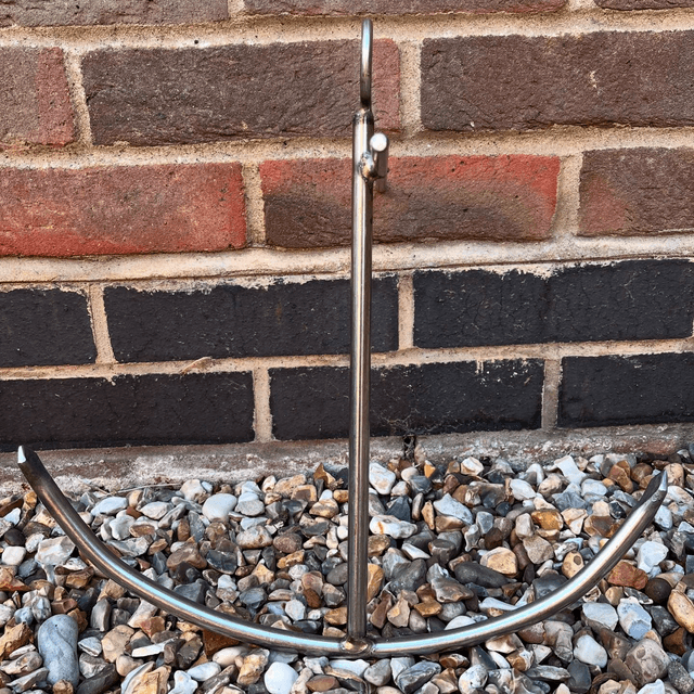 A Stainless Steel Decorative Sculpture Of An Anchor 