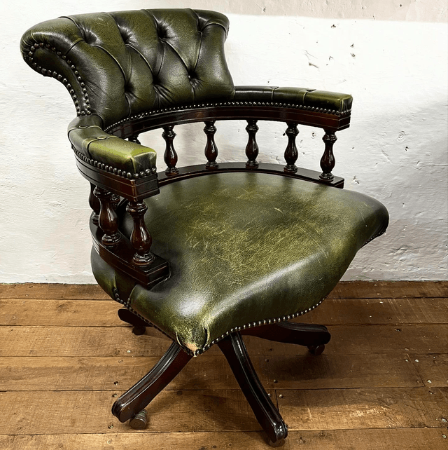 A Vintage Chesterfield Captains Chair Finished In Green Leather