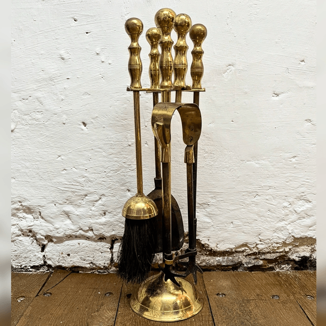 A 20th Century Brass Fireside Companion Set