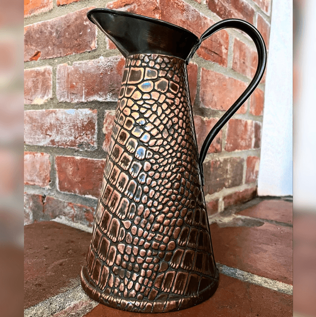 An Arts &amp; Crafts Copper Hot Water Jug By Joseph Sankey and Sons