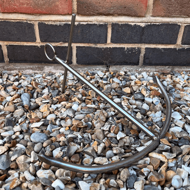 A Stainless Steel Decorative Sculpture Of An Anchor 